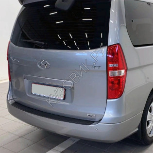 Бампер задний в цвет кузова Hyundai Grand Starex (2007-2018)